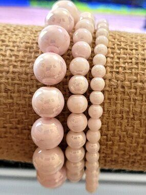 Eye Catching Pale Pink Beads in Varied Sizes